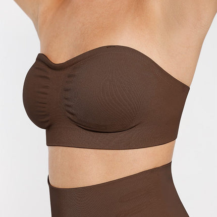 Wholesale Seamless Strapless Wireless Breast Support Bra with Removable Cup Pad.