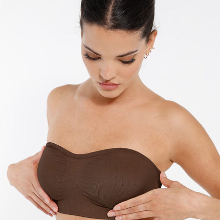 Wholesale Seamless Strapless Wireless Breast Support Bra with Removable Cup Pad.